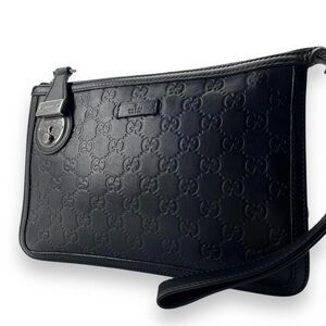 Gucci Black Embossed Leather Clutch